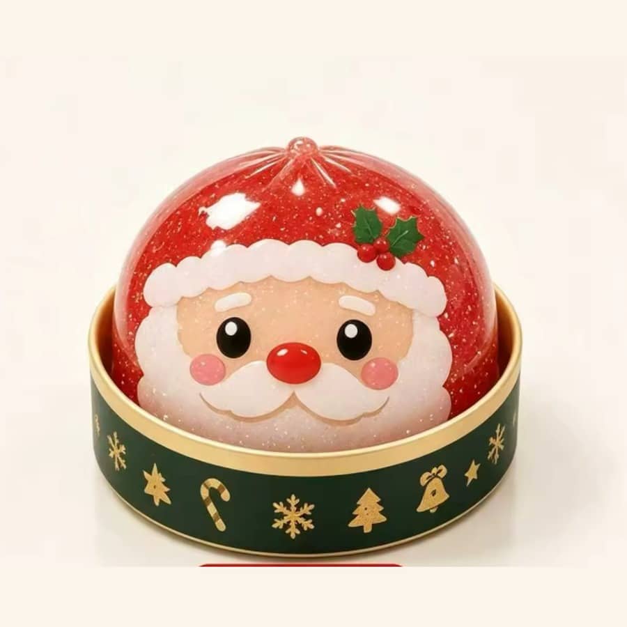 Santa Squishy Dumpling in a green and gold tin